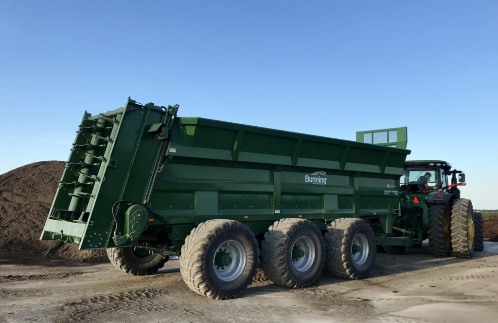 Lowlander 380 HD TVA Widebody with slurry door, 530mm bolt on extensions, lift off augers, spinner deck ready, stone guard extension, sprung suspension, front and rear steering axles with 650/55 R26.5 wheels